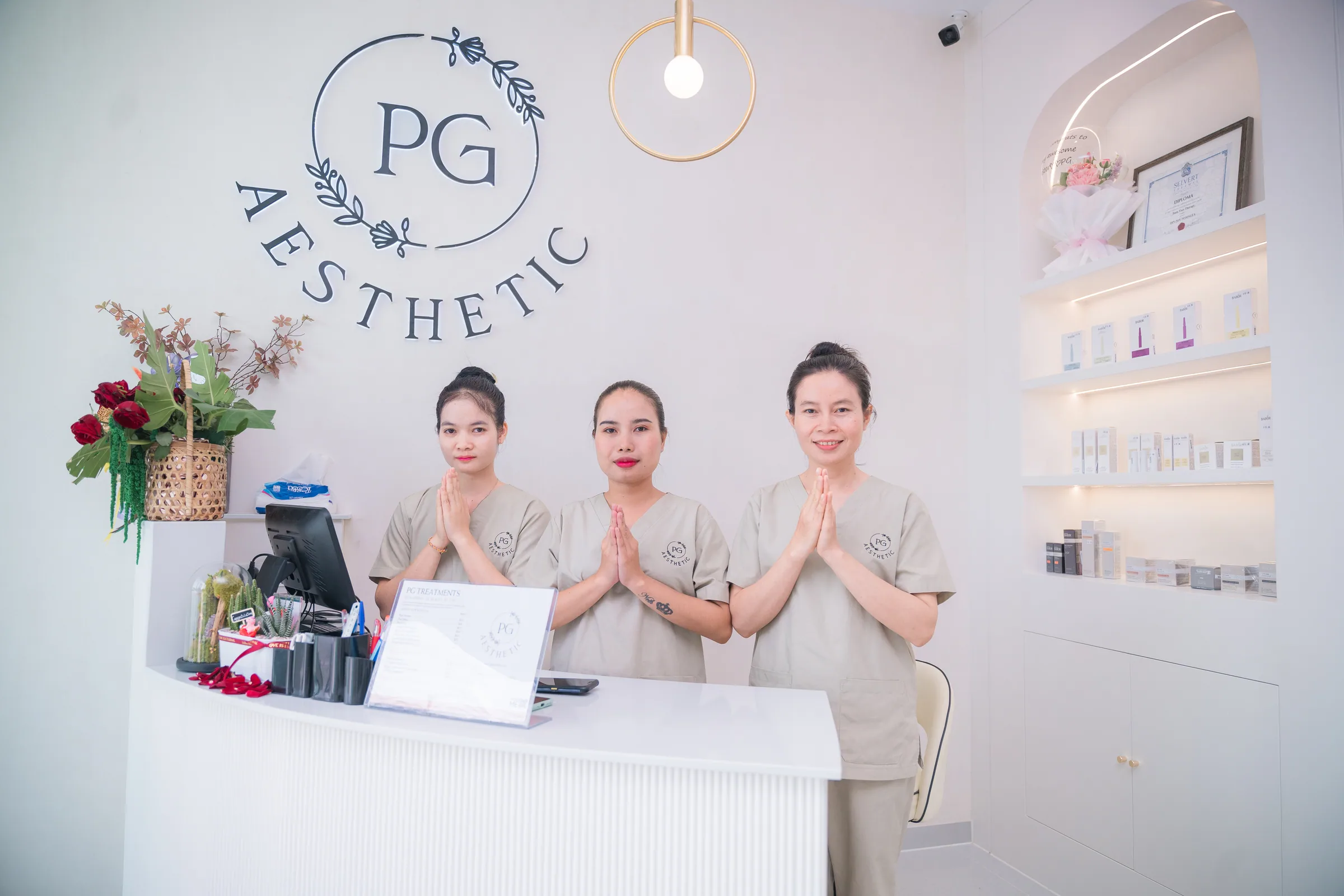 PG Aesthetic team welcoming a client at reception